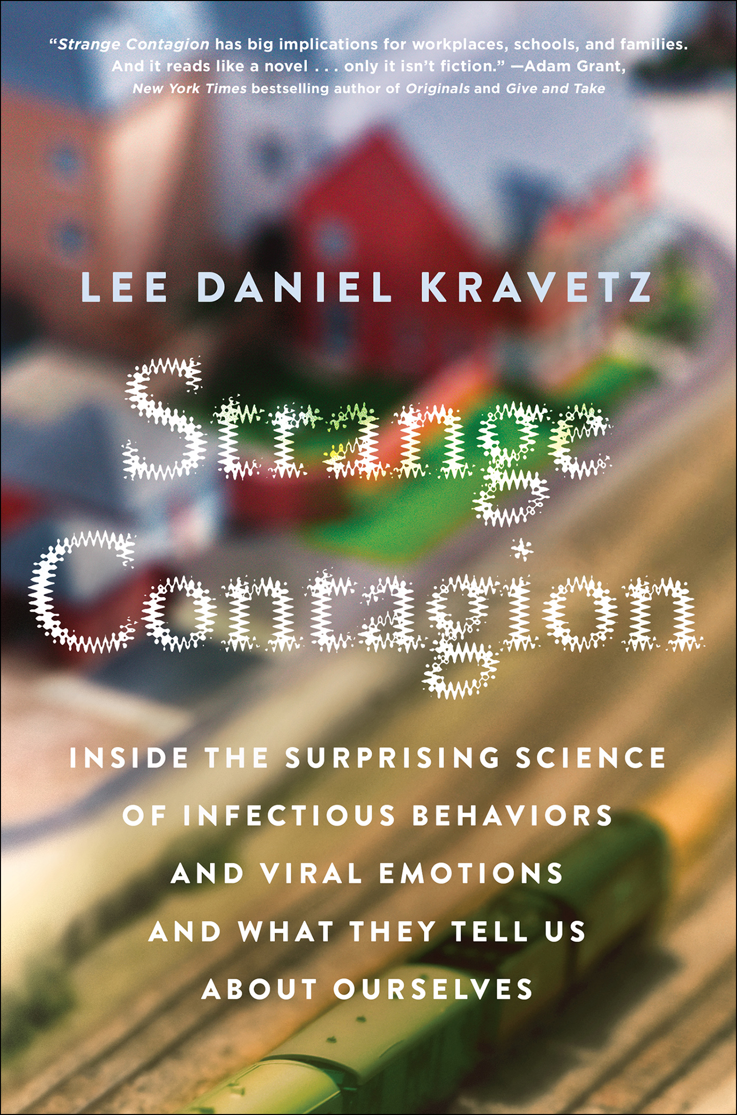 Strange contagion inside the surprising science of infectious behaviors and viral emotions and what they tell us about ourselves cover image